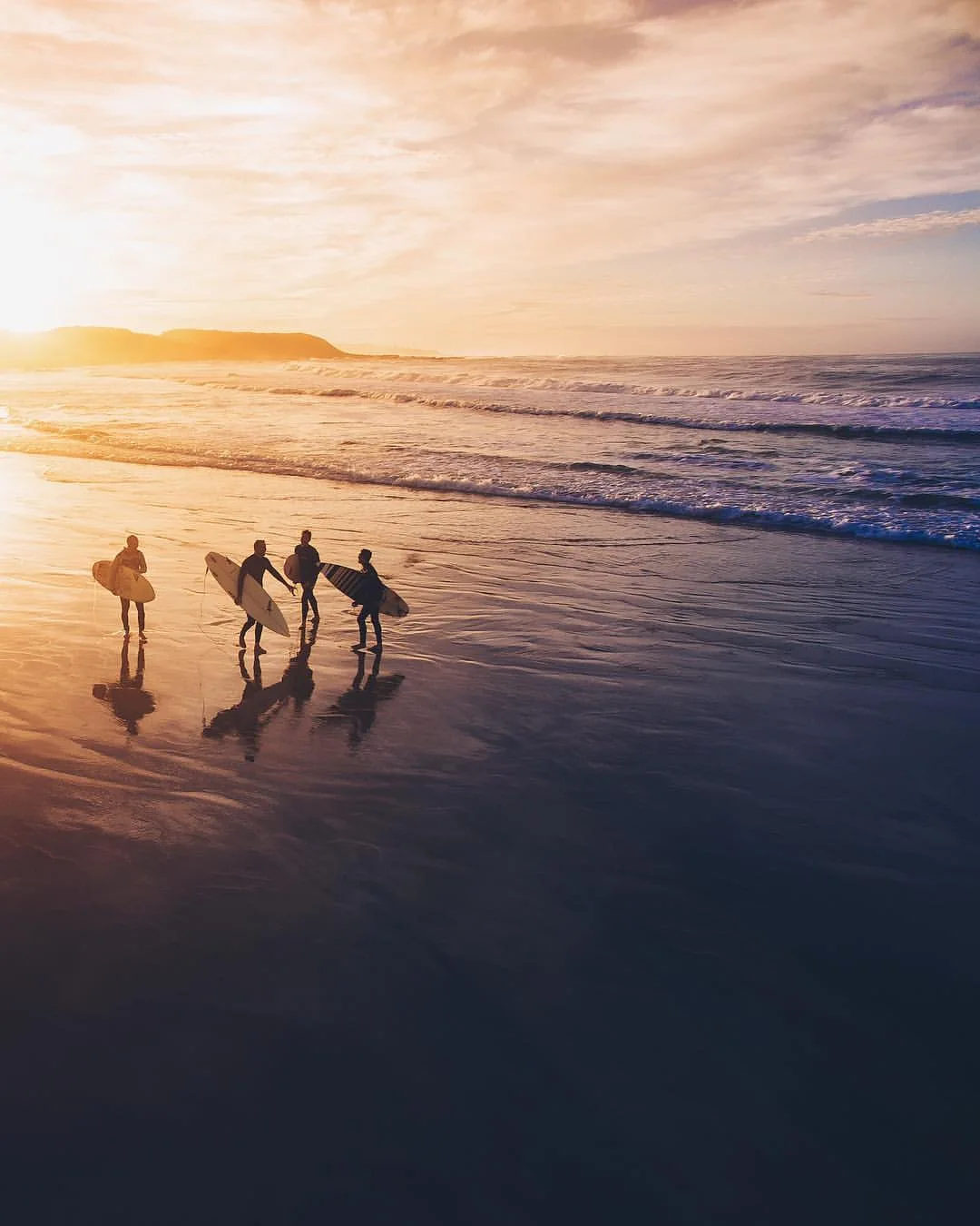 Surfers at Sardinia Bay